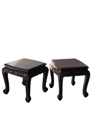 Pair of small carved exotic wood tables
Modern...