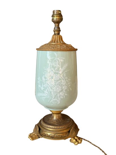 Celadon green porcelain vase with floral...