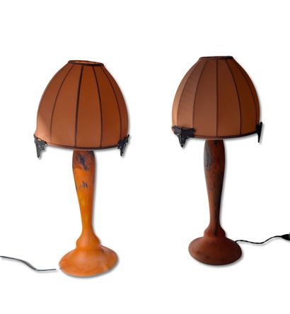 Pair of lamp bases in orange-tinted glass...