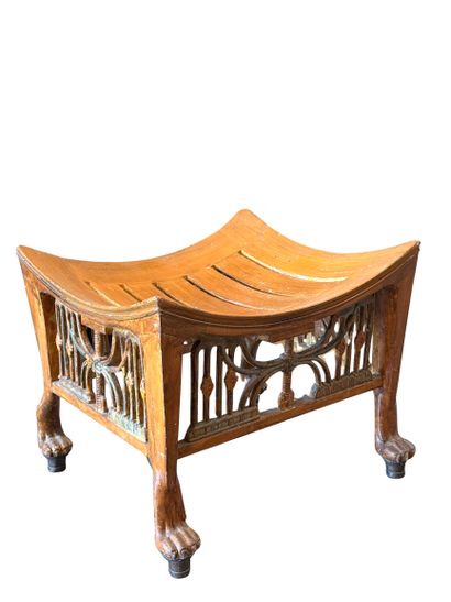 Painted, openwork wooden footstool in antique...