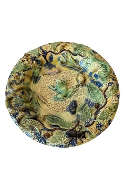 Round polychrome earthenware dish with an...