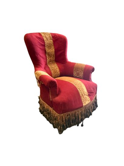Carmine velvet armchair with trimmings
Late...