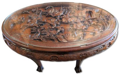 CHINA
Carved wooden coffee table with a glass...