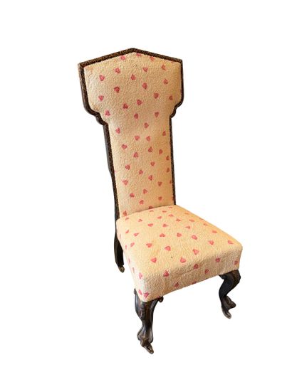 Blackened and gilded wooden chair
Upholstered...