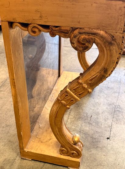 Carved and gilded wooden console table with...