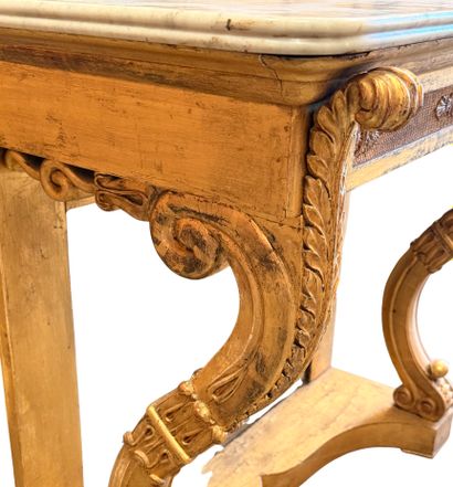Carved and gilded wooden console table with...