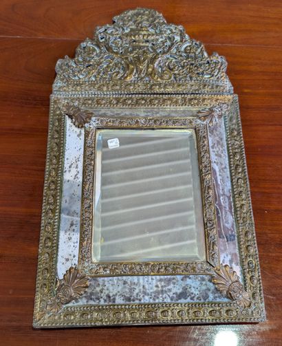 Small mirror with metal-plated frame and...