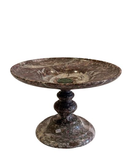 Large bowl in veined pink marble featuring...