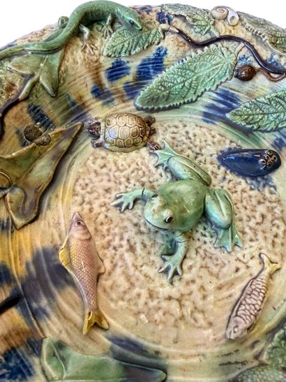 Round polychrome earthenware dish with an...