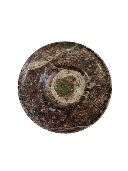 Large bowl in veined pink marble featuring...