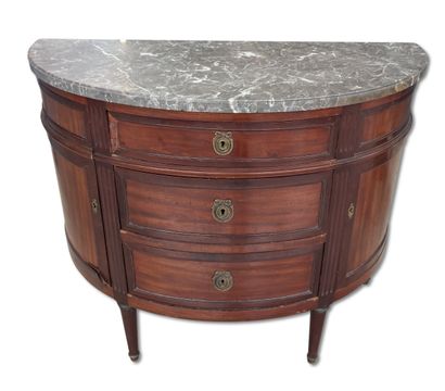 Half-moon chest of drawers made of mahogany...