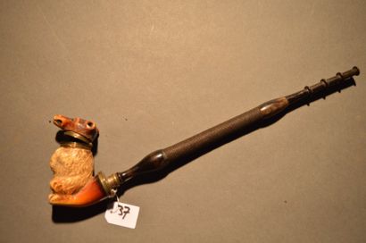 Charmante pipe en écume de mer sculptée représentant...