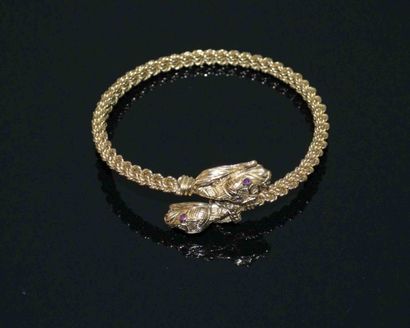 BRACELET RIGIDE en or jaune à têtes de serpent...