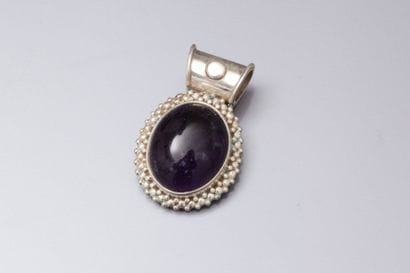Pendentif en argent serti d'une importante...