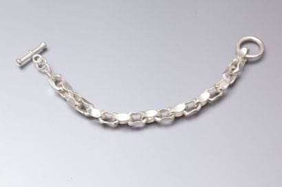 Bracelet en argent maille fantaisie entrelacée.

Poids:...