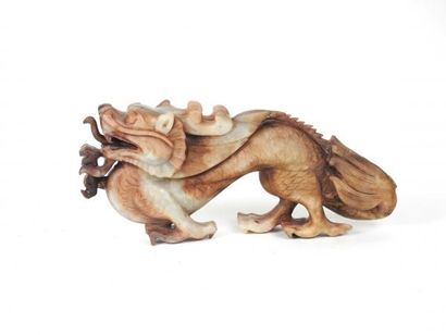 Chine

Dragon crachant le feu en jadeïte...