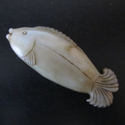 Pendentif en forme de poisson, symbole d’abondance....