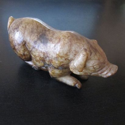 Statuette de cochon, symbole d’opulence,...