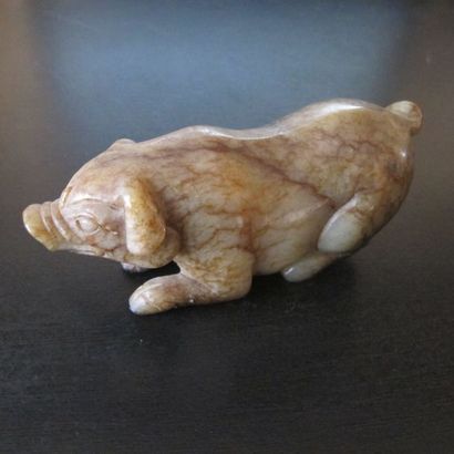 Statuette de cochon, symbole d’opulence,...