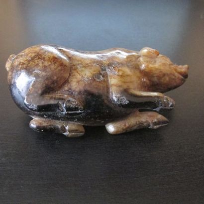 Statuette de cochon, symbole d’opulence,...