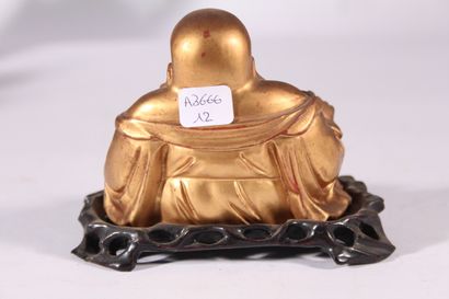Statuette de Budai en bois laqué

Chine,...
