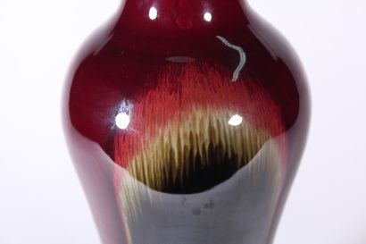 Vase en porcelaine flammée

Chine, XXème...