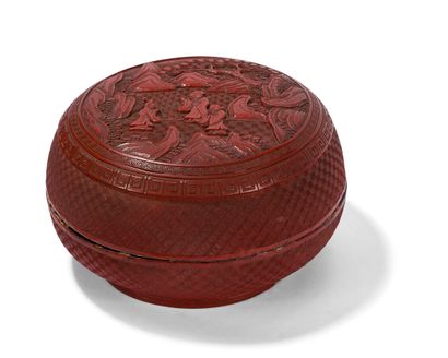 Boîte ronde couverte en laque rouge sculptée

Chine,...