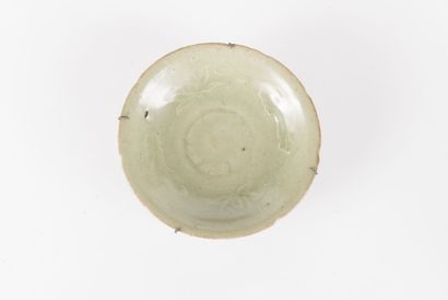 Three celadon glazed stoneware bowls and...