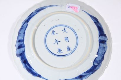 Quatre assiettes en porcelaine bleu blanc
Chine,...