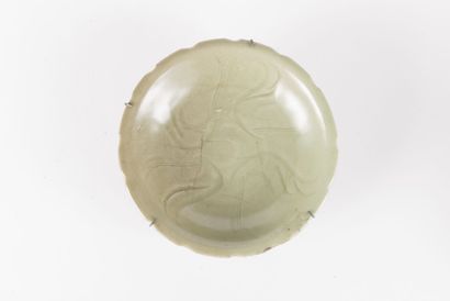 Three celadon glazed stoneware bowls and...