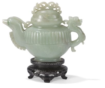 Celadon jade teapot
China, 20th century
The...