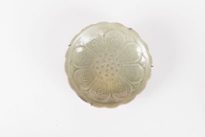 Three celadon glazed stoneware bowls and...