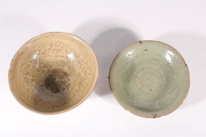 Three celadon glazed stoneware bowls and...