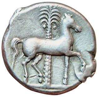 Tetradrachma. 350-315 B.C. A/ Head of Tanit...
