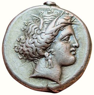 Tetradrachma. 350-315 B.C. A/ Head of Tanit...