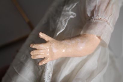 STEINER. Wiggling baby doll, head made of...