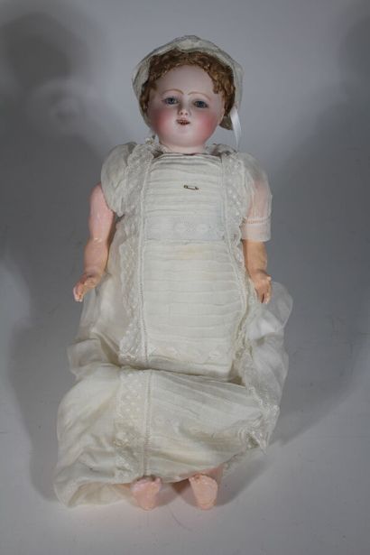 STEINER. Wiggling baby doll, head made of...