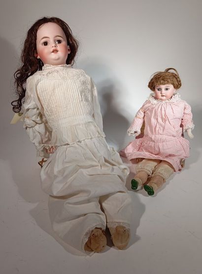 Reunion of 2 German dolls. The first is a...