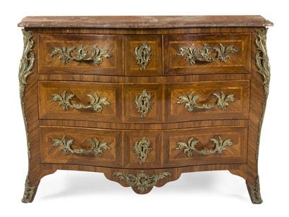COMMODE EN BOIS DE VIOLETTE
de forme mouvementée...