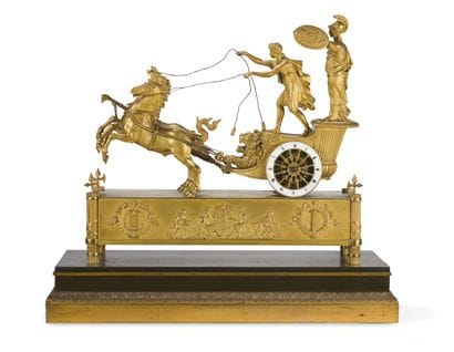 PENDULE AU CHAR DE TÉLÉMAQUE EN BRONZE DORÉ
le...