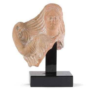 BUSTE PROVENANT D'UNE STATUETTE
représentant...