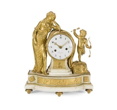 PENDULE À VÉNUS ET L'AMOUR EN BRONZE DORÉ...