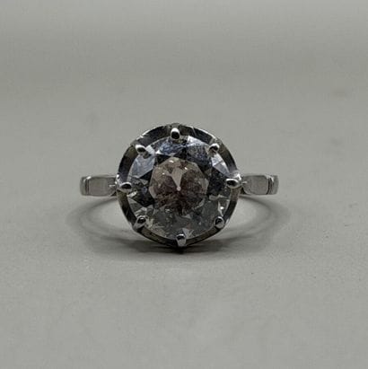 850-th platinum ring set with a single vintage-cut...