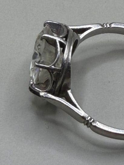 850-th platinum ring set with a single vintage-cut...