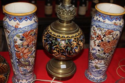 Une paire de vases en faience, decor en reserve...