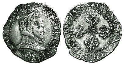 HENRI III.
Franc au col plat. 1587 H. La...