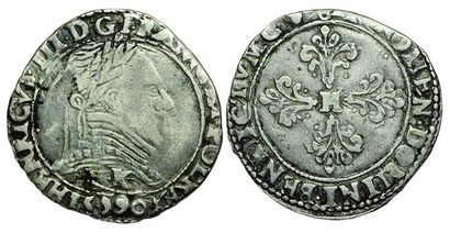 HENRI III.
Demi Franc au col plat. 15590...