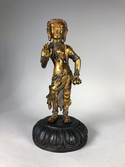 Sujet en bronze doré et argenté représentant...