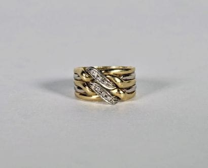 Ring in 18K (750°/°°) yellow and white gold,...