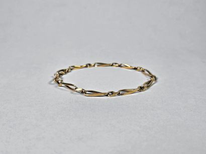 Horse-link bracelet in 18K (750°/°) yellow...